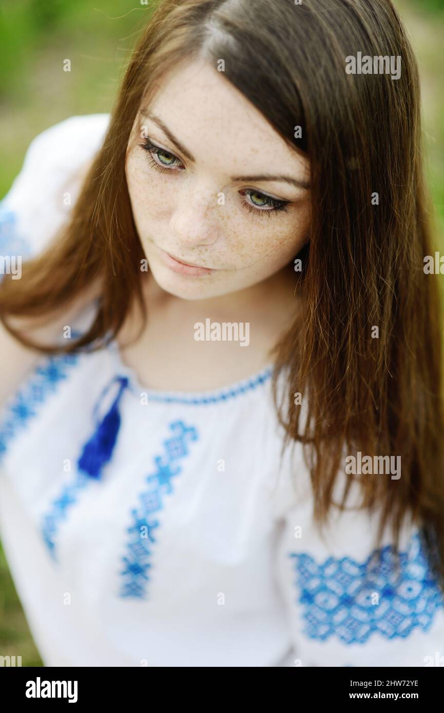 girl with freckles on her face