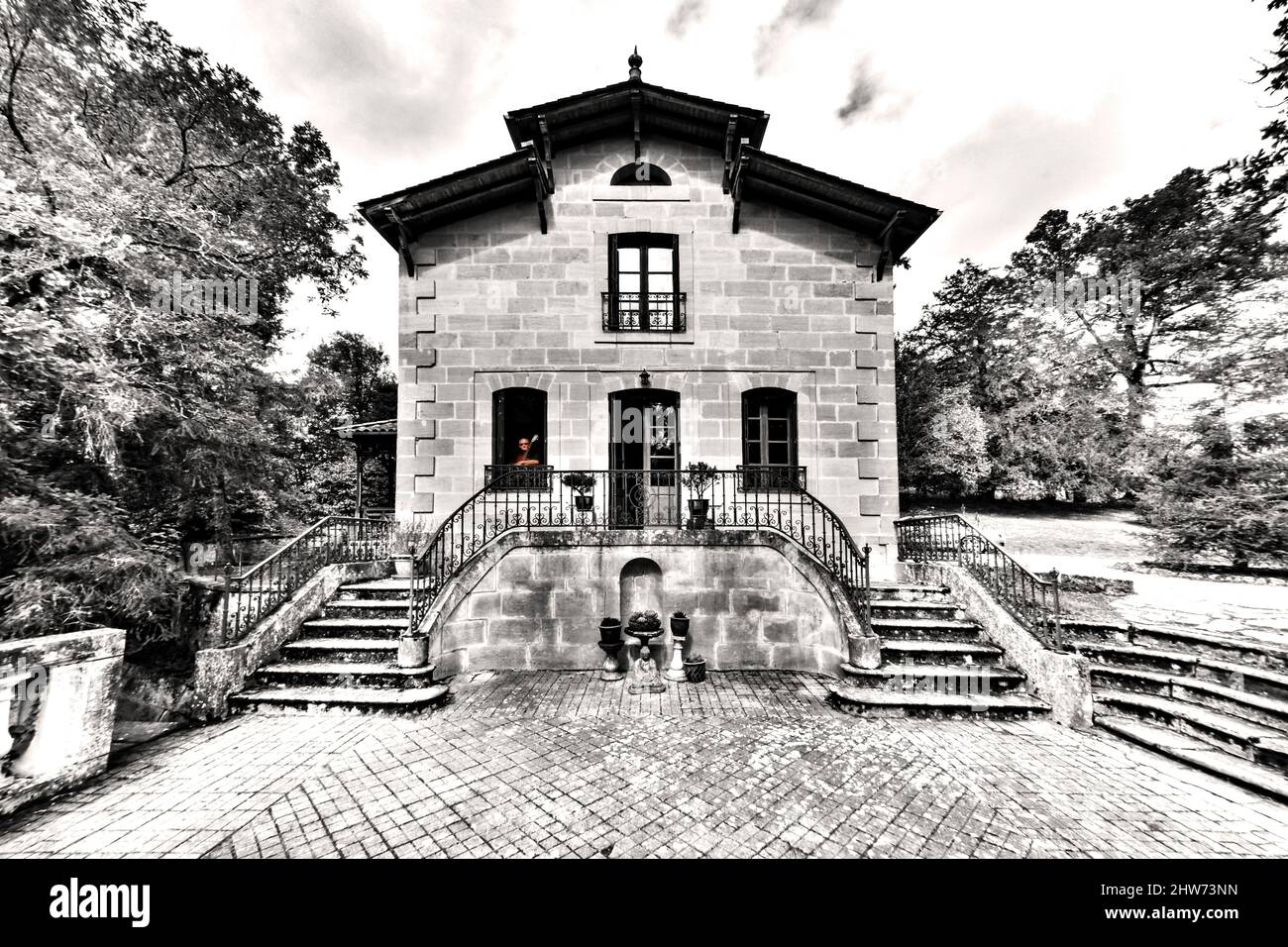 Ghostly Guitarist appears in window of chateau Stock Photo