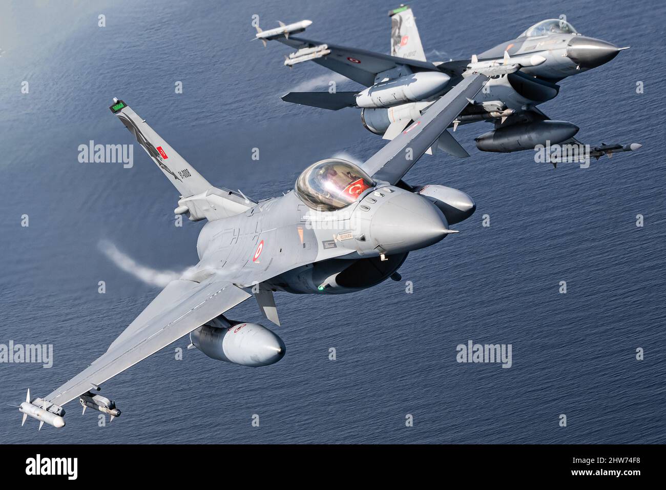 Armed fighter jets during an air-air photoshoot, Turkish F-16s, NATO Baltic Air policing Stock Photo
