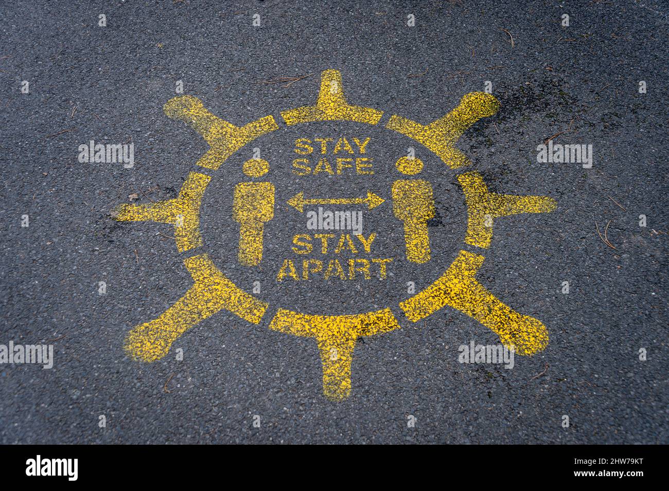 Stay safe, stay apart, covid 19 sign painted on a street in Southampton, Hampshire, UK Stock Photo