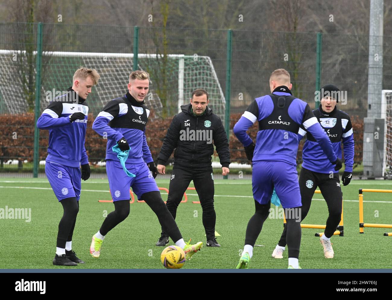 East Mains.Ormiston.Tranent.East Lothian.Scotland.UK.4th March 22 Hibs' Manager, Shaun Maloney, Euan Henderson, James Scott, Josh Campbell & during training session for Cinch Premiership match with St Johnstone Credit: eric mccowat/Alamy Live News Stock Photo