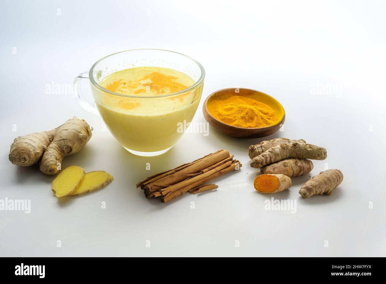 Golden turmeric milk with ginger, cinnamon and more ingredients