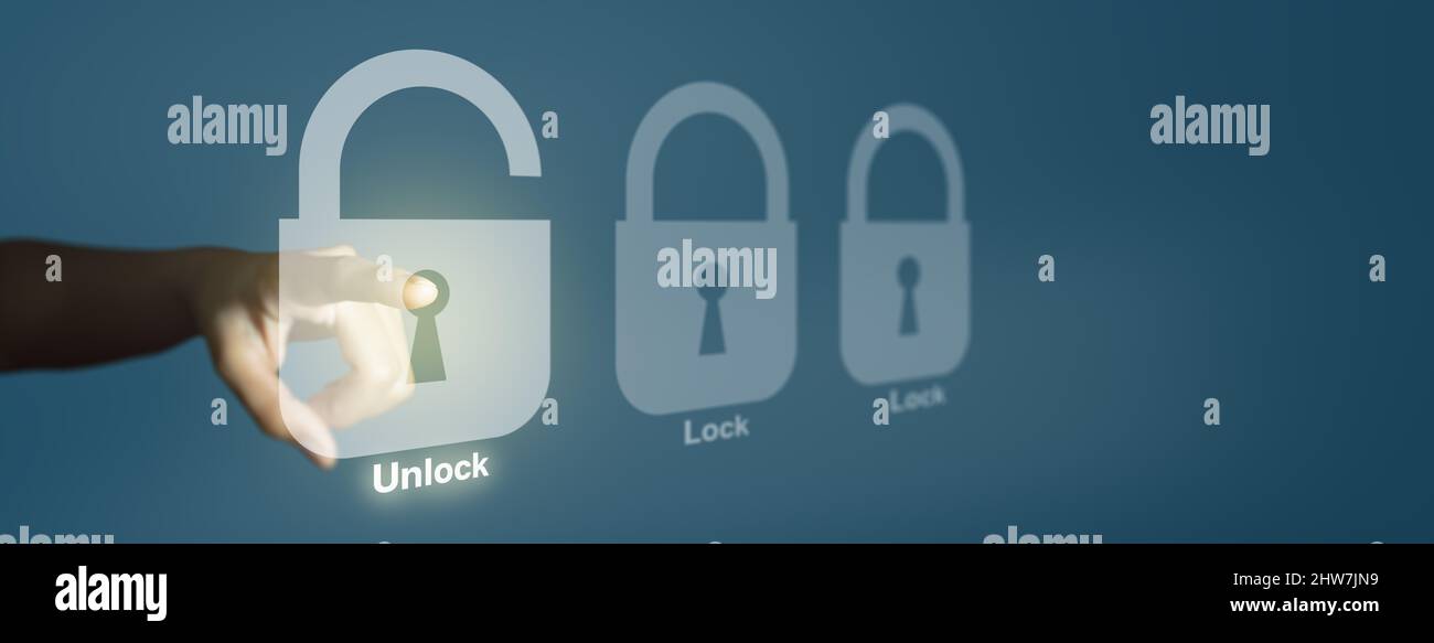 Businessman hand is unlocking security system. Online data security system and network cyber security technology. Cybersecurity, managed services. Stock Photo