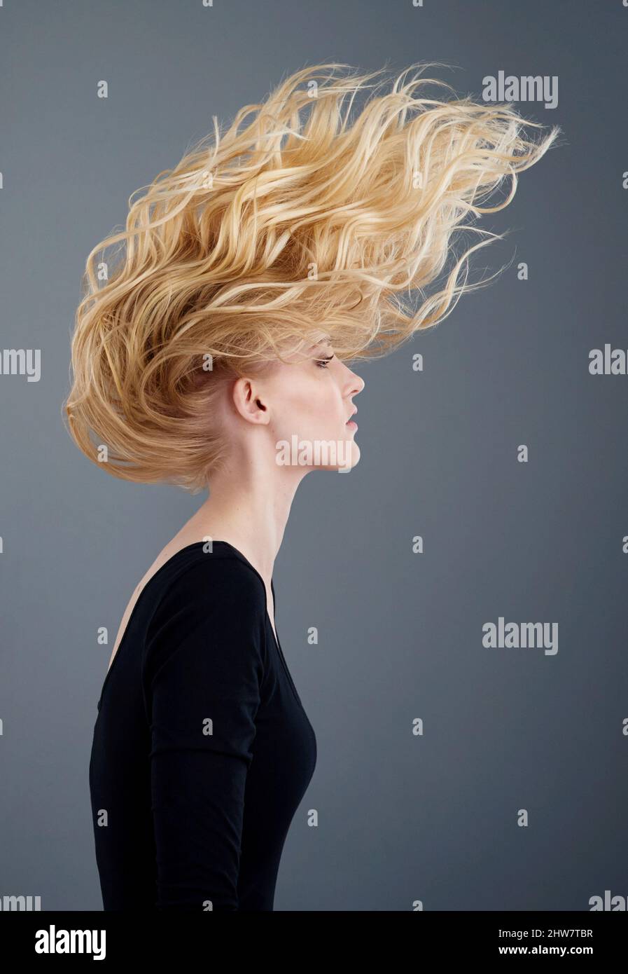 Woman long curly hair blowing hi-res stock photography and images - Alamy