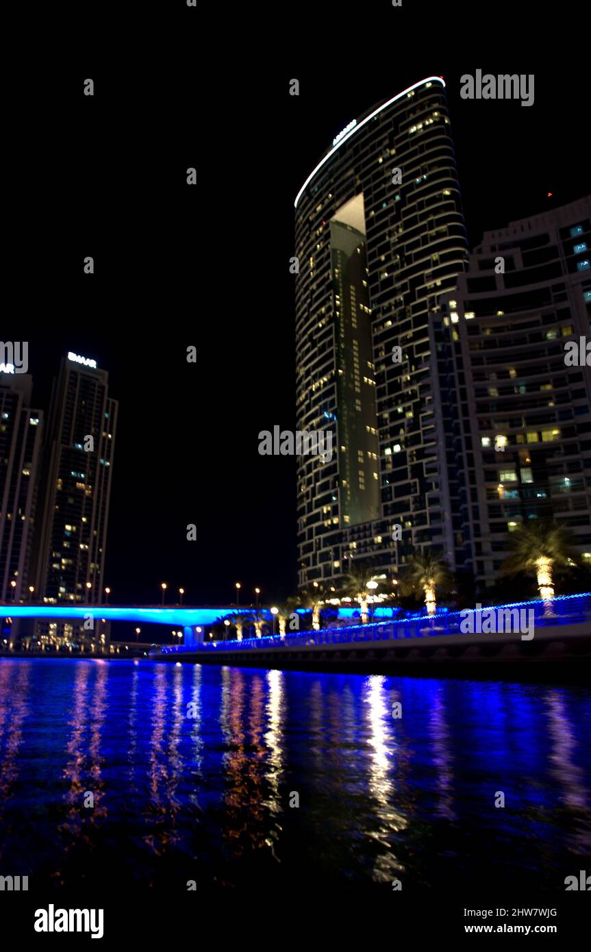 Vertical shot of Address Dubai Marina hotel at night. Dubai, United Arab Emirates. Stock Photo