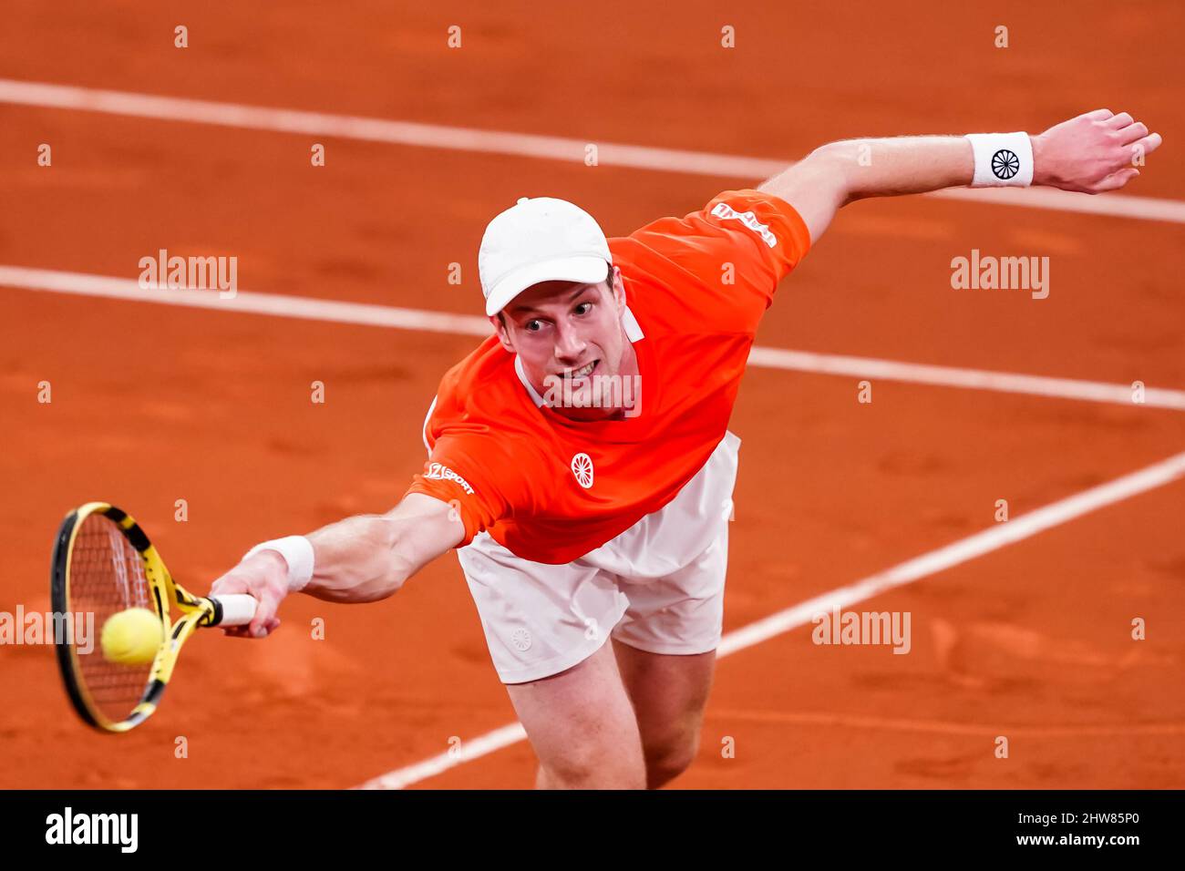 The Hague, Netherlands. 04th Mar, 2022. Den Haag, Netherlands. 04th Mar, 2022. DEN HAAG, NETHERLANDS - MARCH 4: Botic van de Zandschulp of the Netherlands plays a forehand volley in his singles match against Alexis Galarneau of Canada during the 2022 Davis Cup Qualifier between Netherlands and Canada at Sportcampus Zuiderpark on March 4, 2022 in Den Haag, Netherlands (Photo by Andre Weening/Orange Pictures) Credit: Orange Pics BV/Alamy Live News Credit: Orange Pics BV/Alamy Live News Stock Photo