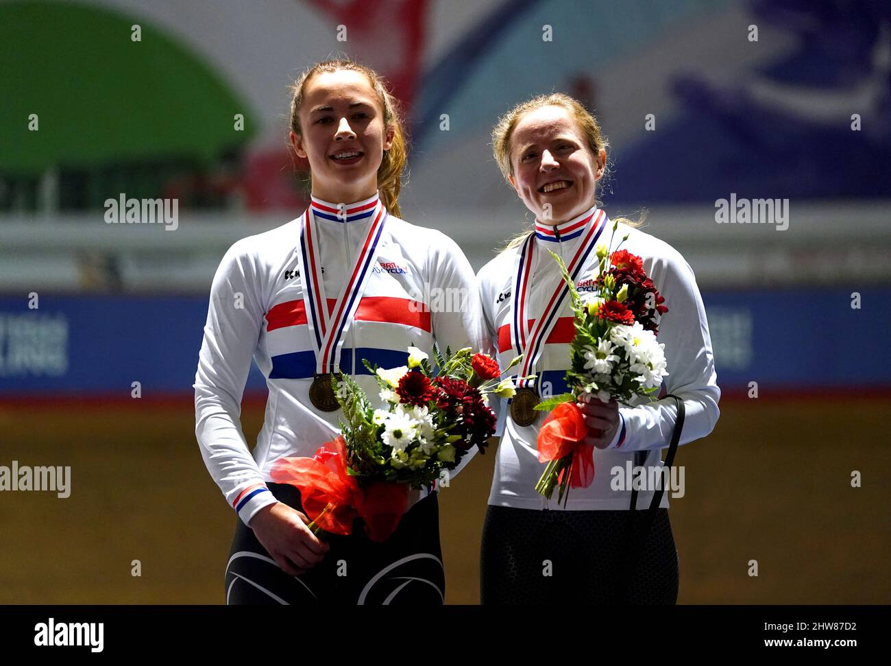 Lora Fachie MBE (right) and pilot Georgia Holt celebrate with their medals after winning the Tandem Sprint Championship during day two of the HSBC UK National Track Championships at the Geraint Thomas National Velodrome, Newport. Stock Photo