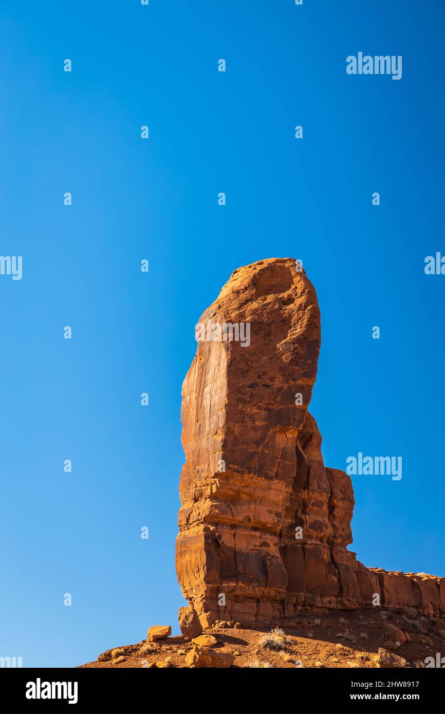 Classic southwest desert landscape under a blue sky and bright sun in Monument Valley in Arizona and Utah. Stock Photo