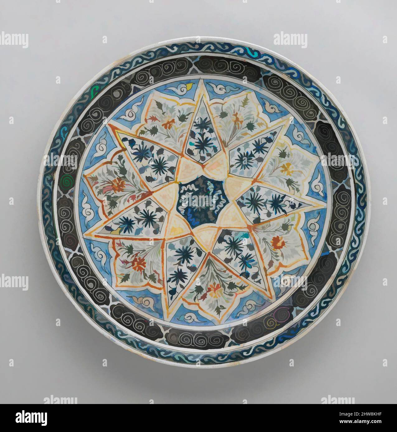 Art inspired by Plate with Vegetal Decoration in a Seven-pointed Star, 17th century, Attributed to Kirman. Made in Iran, Stonepaste; polychrome painted under transparent glaze, H. 2 1/2 in. (6.4 cm), Ceramics, Classic works modernized by Artotop with a splash of modernity. Shapes, color and value, eye-catching visual impact on art. Emotions through freedom of artworks in a contemporary way. A timeless message pursuing a wildly creative new direction. Artists turning to the digital medium and creating the Artotop NFT Stock Photo