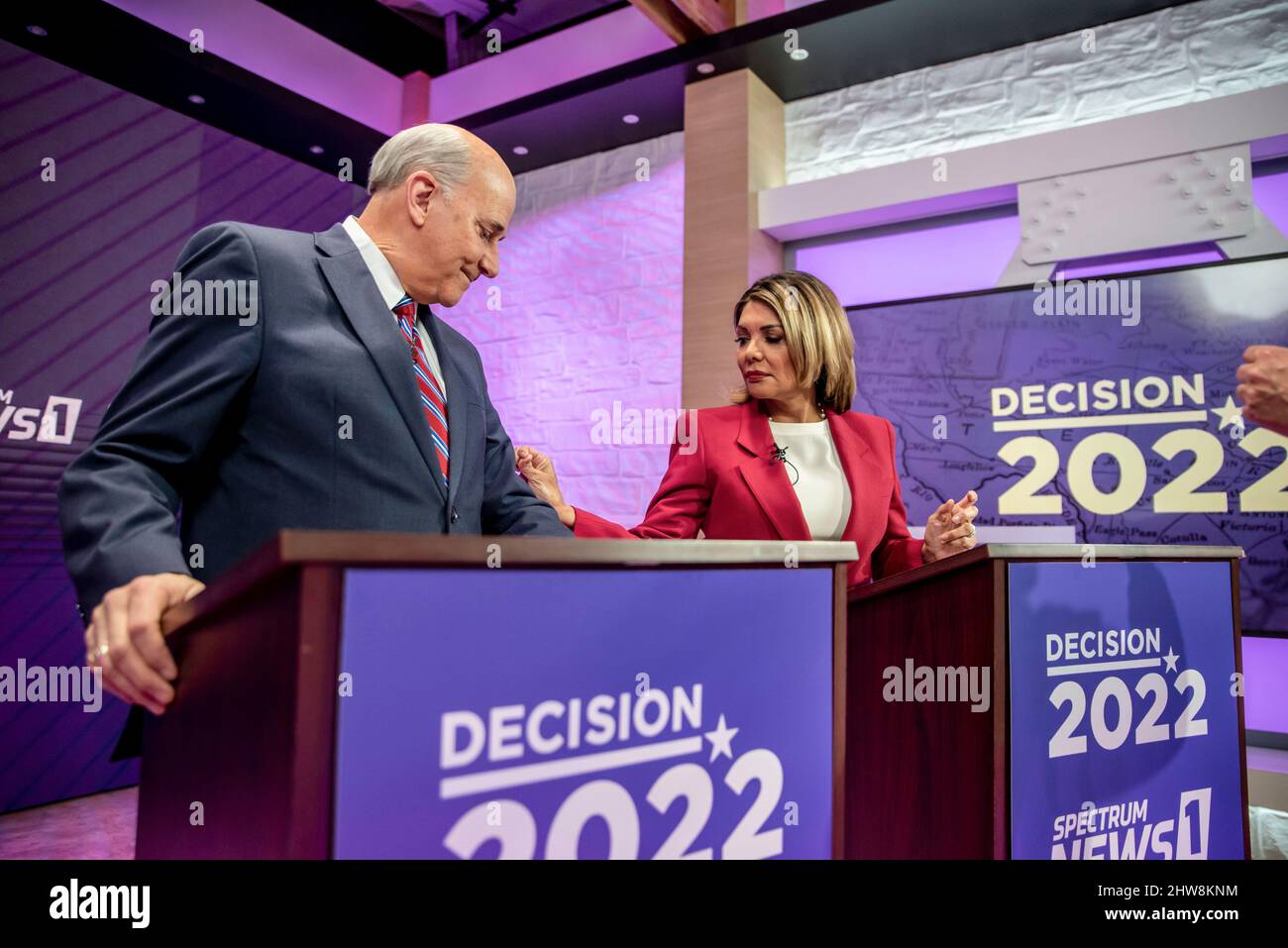 Austin Texas USA,, Feb. 24, 2022: Republican candidates for state attorney general shake hands at conclusion of a televised debate. From left: U.S. Rep. Louie Gohmert, R-Tyler; and former state Supreme Court Justice Eva Guzman. Sergio Flores/pool Stock Photo