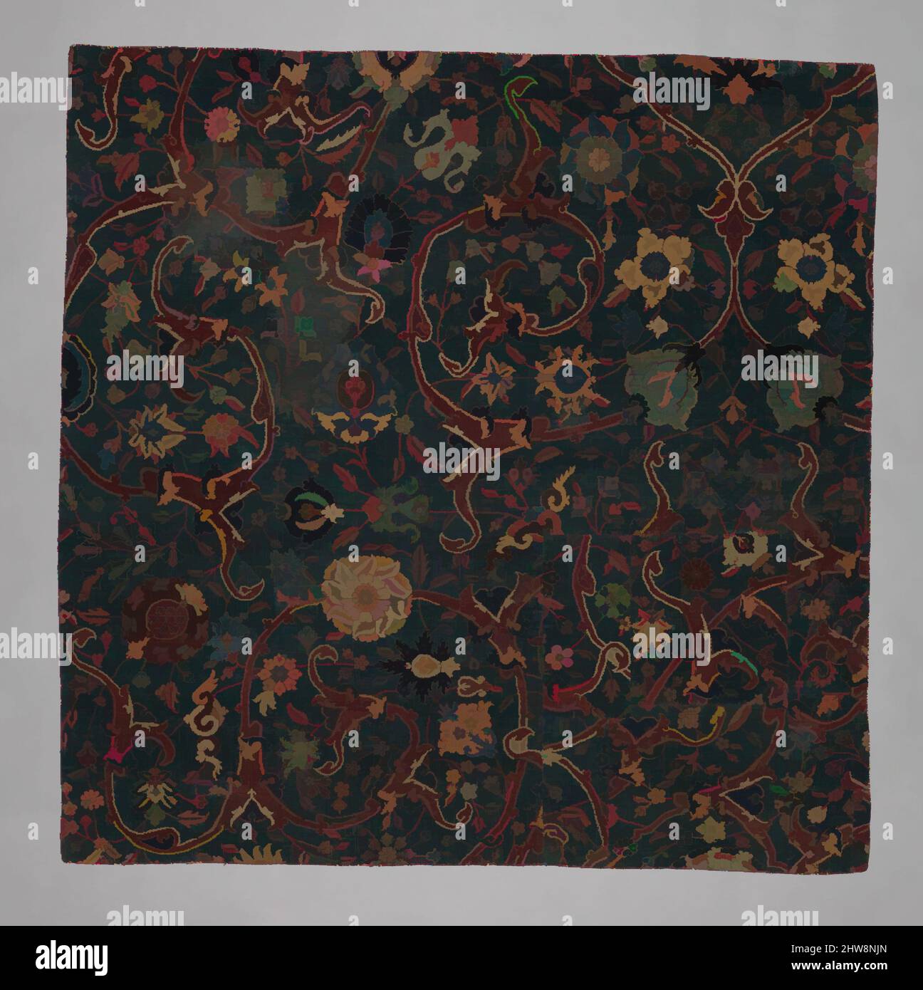 Art inspired by Blue-ground Carpet Fragment with Scrolling Floral Vines, 17th century, Made in Iran, probably Kirman, Cotton (warp), wool (weft and pile); asymmetrically knotted pile, Rug: H. 54 1/8 in. (137.5 cm), Textiles-Rugs, This fragment of a carpet bears a variety of flowers on, Classic works modernized by Artotop with a splash of modernity. Shapes, color and value, eye-catching visual impact on art. Emotions through freedom of artworks in a contemporary way. A timeless message pursuing a wildly creative new direction. Artists turning to the digital medium and creating the Artotop NFT Stock Photo