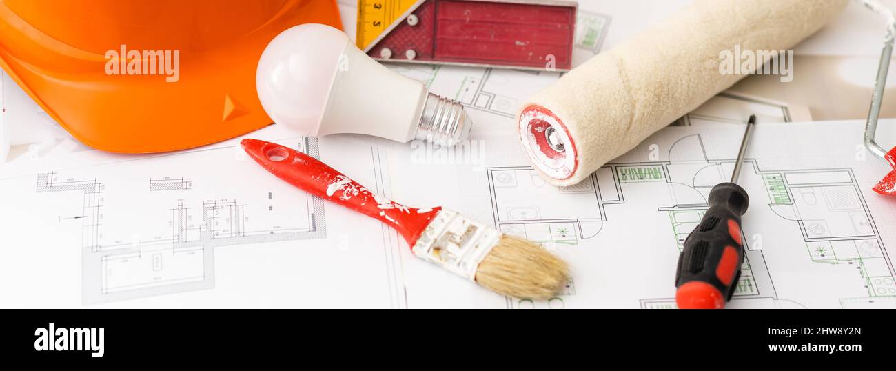 Construction blueprints with tools and tablet, top view Stock Photo
