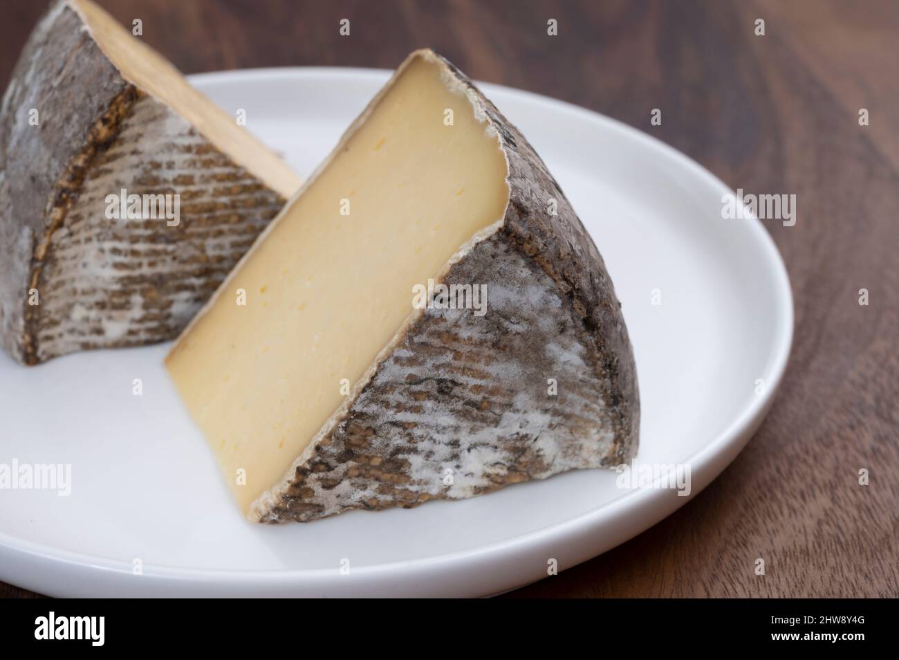 French mountain cheese from Alps, tomme de Savoie, close up Stock Photo