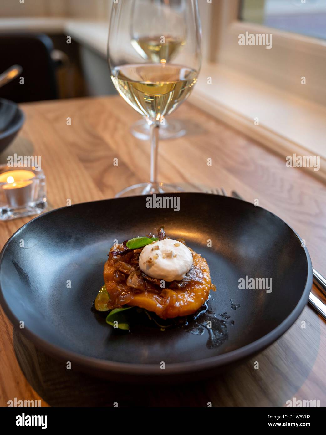 French starter dish tarte tatin of loaf with caramelized onions and