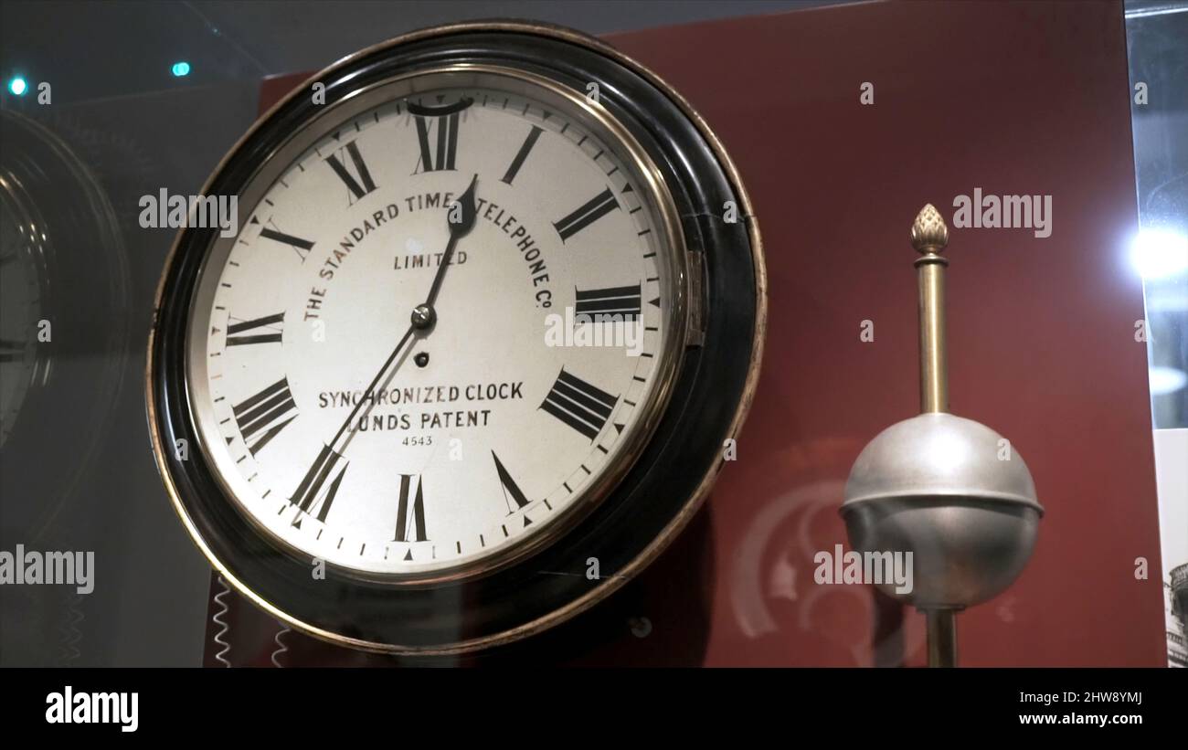 Vintage floor clock in Museum. Action. Old large clock with beautiful