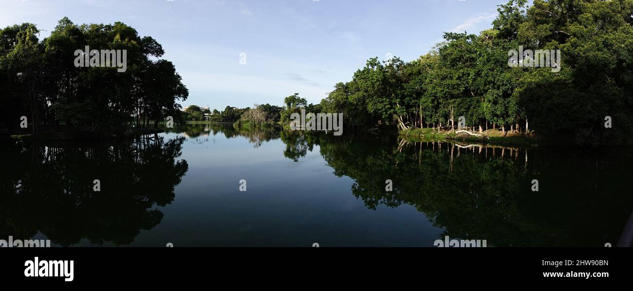 Beautiful landscape of a lake with the reflection of the surrounding ...