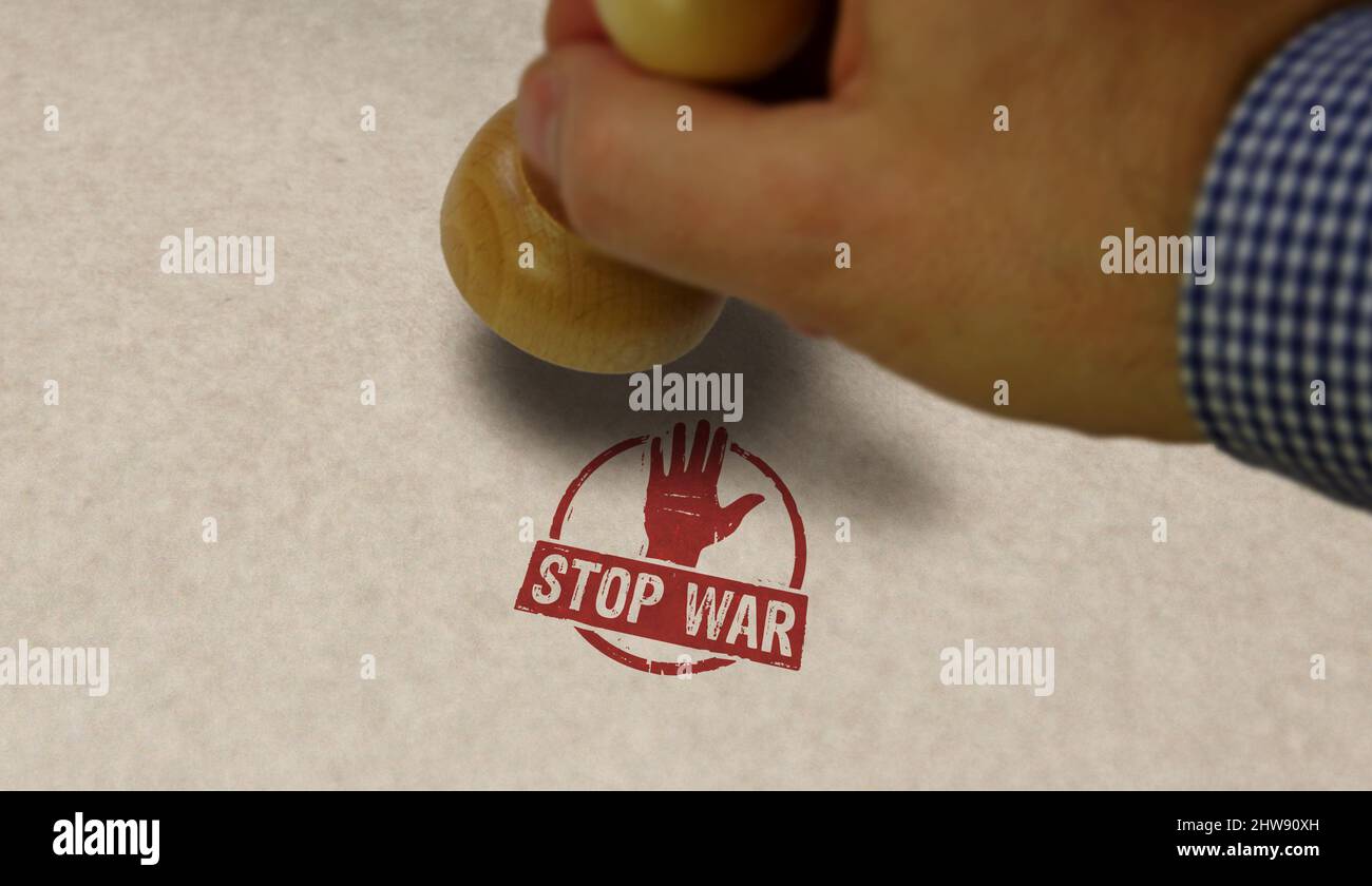 Stop war stamp and stamping hand. Peace, no aggression and pacifism concept. Stock Photo