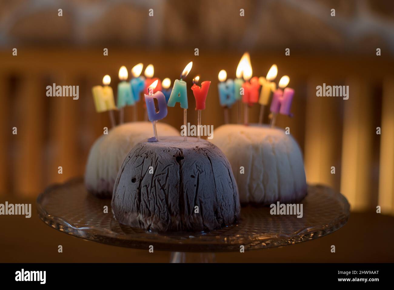 Birthday celebration cake with candles lighten up for wish Stock Photo