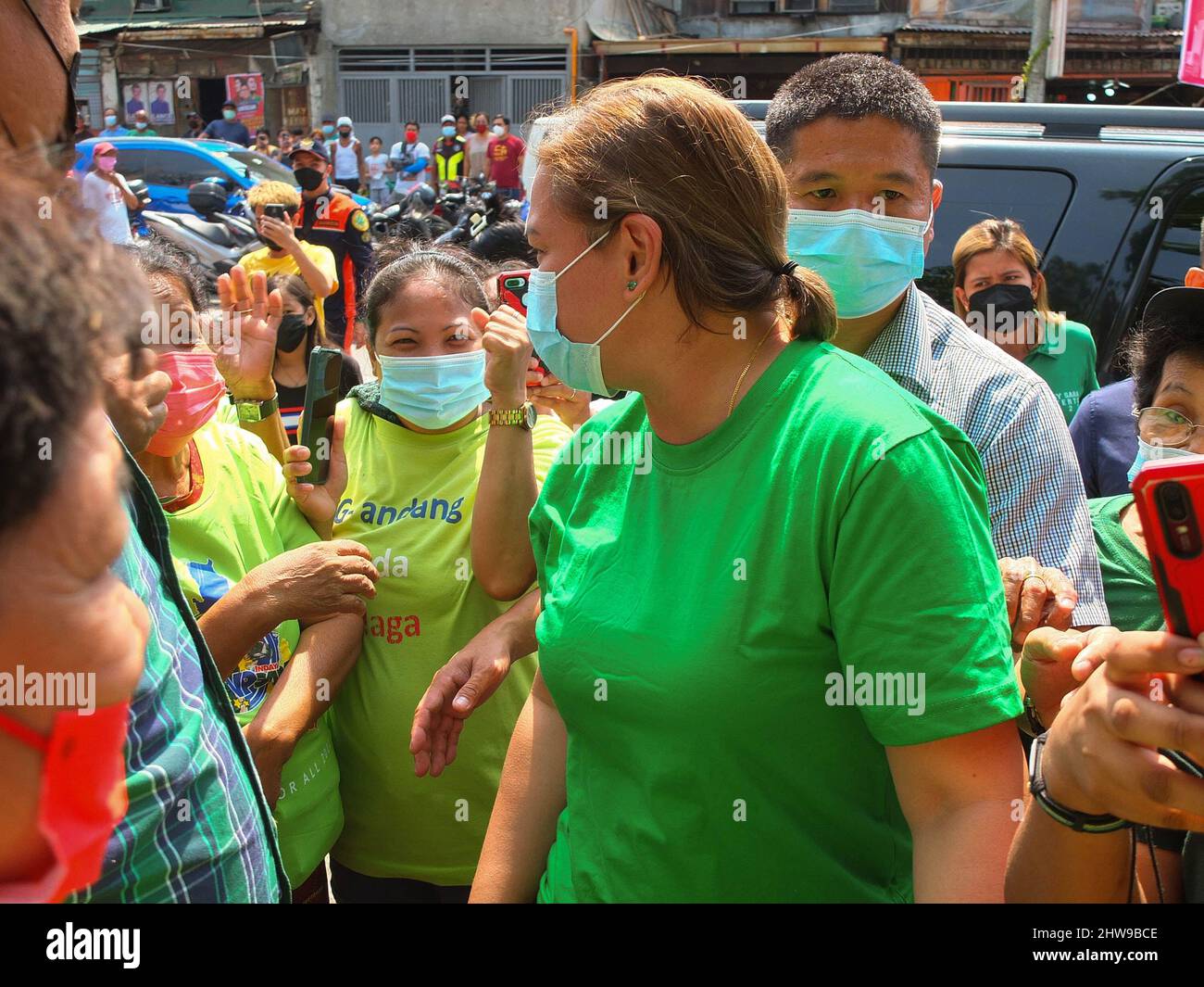 Mayor Sara Duterte-Carpio walks towards the Nazal compound in Navotas City. Presidential daughter and Davao City Mayor Sara Duterte-Carpio visit Navotas City. It is the UniTeam's northern Metro Manila campaign swing. The Vice Presidential aspirant was also the chairperson of the Lakas-Christian Muslim Democrats (CMD) party. Her Presidential running mate Ferdinand 'Bongbong' Marcos Jr. was not present because of a campaign sortie in the province of Sorsogon. Stock Photo