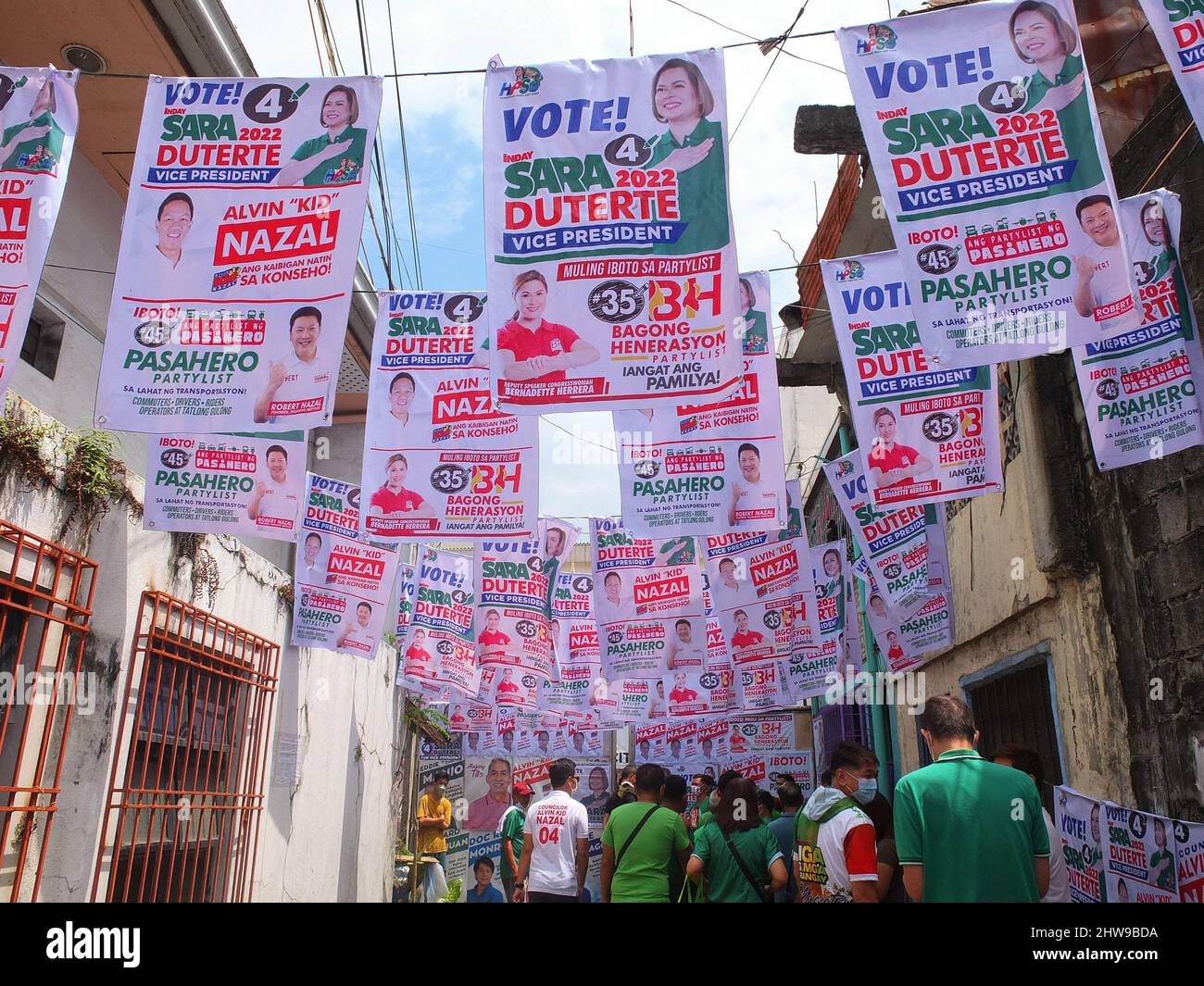 Different kinds of campaign posters are seen hanging at the Nazal Compound. Presidential daughter and Davao City Mayor Sara Duterte-Carpio visit Navotas City. It is the UniTeam's northern Metro Manila campaign swing. The Vice Presidential aspirant was also the chairperson of the Lakas-Christian Muslim Democrats (CMD) party. Her Presidential running mate Ferdinand 'Bongbong' Marcos Jr. was not present because of a campaign sortie in the province of Sorsogon. Stock Photo