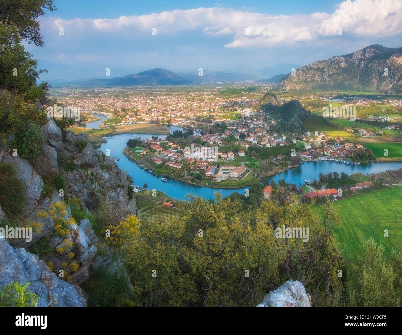 A beautiful panorama of the Dalyan river valley with a view of the town, mountains and river from the view point of the ancient city of Kaunos Stock Photo