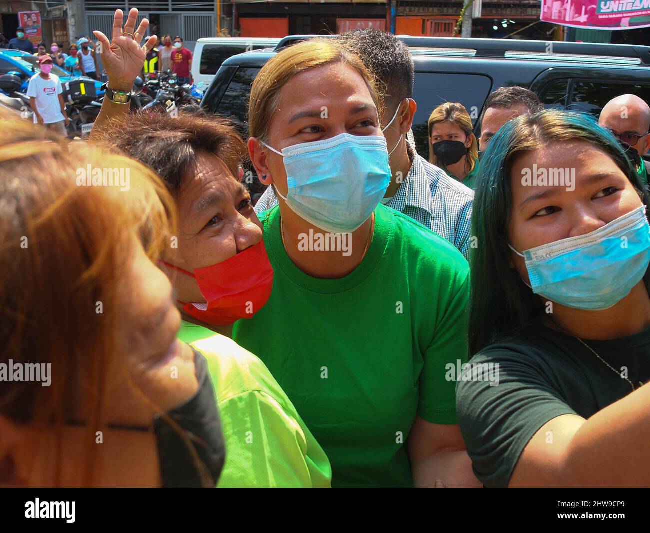 Navotas, Philippines. 4th Mar, 2022. Mayor Sara Duterte-Carpio posed for a picture with her supporters during the event .Presidential daughter and Davao City Mayor Sara Duterte-Carpio visit Navotas City. It is the UniTeam's northern Metro Manila campaign swing. The Vice Presidential aspirant was also the chairperson of the Lakas-Christian Muslim Democrats (CMD) party. Her Presidential running mate Ferdinand ''Bongbong'' Marcos Jr. was not present because of a campaign sortie in the province of Sorsogon. (Credit Image: © Josefiel Rivera/SOPA Images via ZUMA Press Wire) Stock Photo