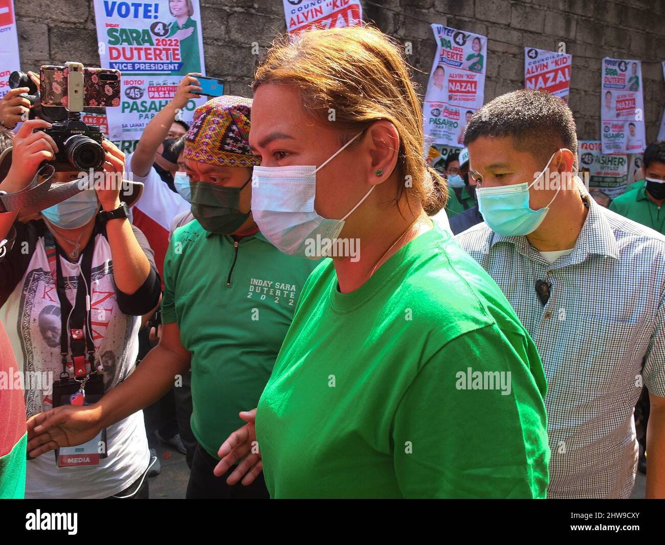 Navotas, Philippines. 4th Mar, 2022. Mayor Sara Duterte-Carpio walks towards the Nazal compound in Navotas City.Presidential daughter and Davao City Mayor Sara Duterte-Carpio visit Navotas City. It is the UniTeam's northern Metro Manila campaign swing. The Vice Presidential aspirant was also the chairperson of the Lakas-Christian Muslim Democrats (CMD) party. Her Presidential running mate Ferdinand ''Bongbong'' Marcos Jr. was not present because of a campaign sortie in the province of Sorsogon. (Credit Image: © Josefiel Rivera/SOPA Images via ZUMA Press Wire) Stock Photo