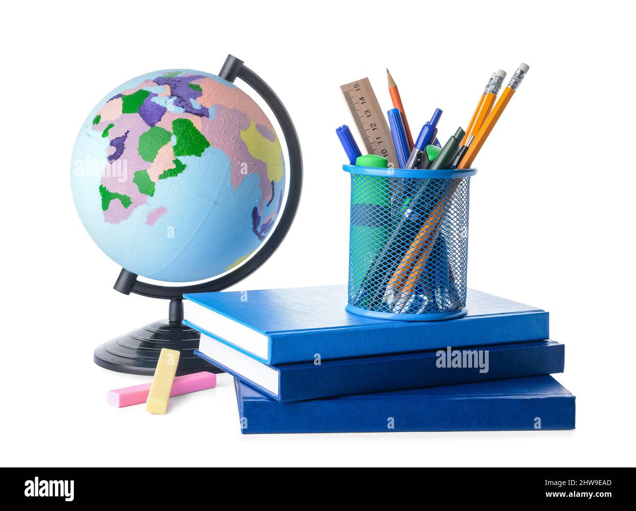Globe, books and stationery on white background Stock Photo Alamy