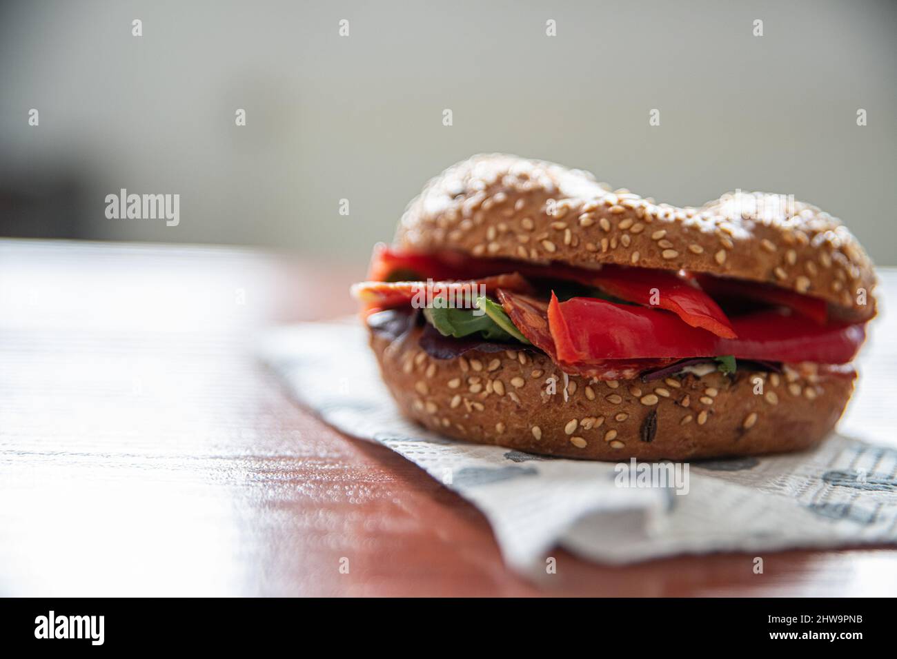 Delicious lunch in work, tasty sandwich with salami Stock Photo
