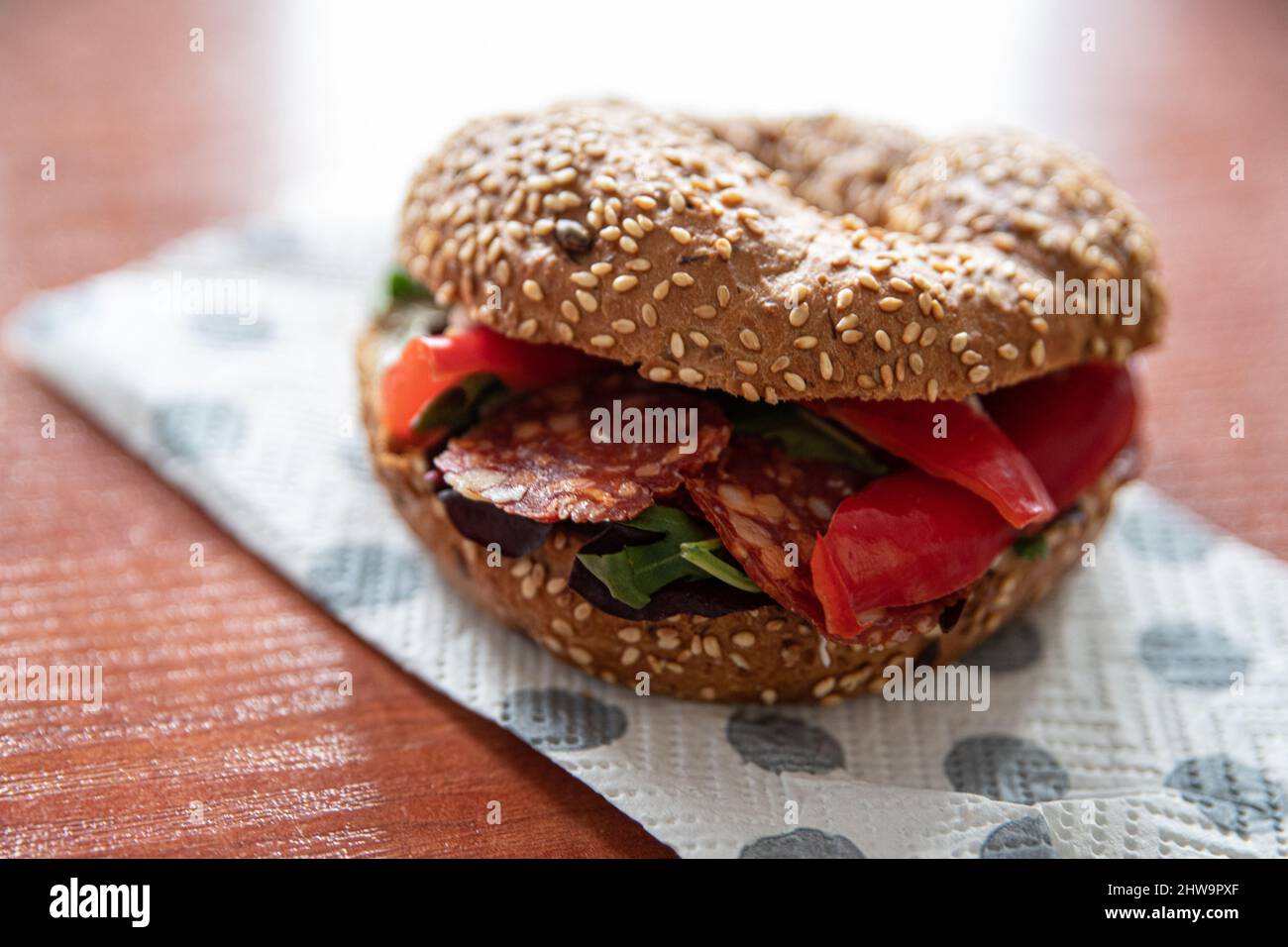 Delicious lunch in work, tasty sandwich with salami Stock Photo