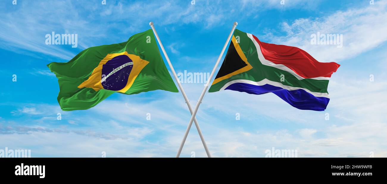 crossed national flags of Brazil and South Africa flag waving in the ...