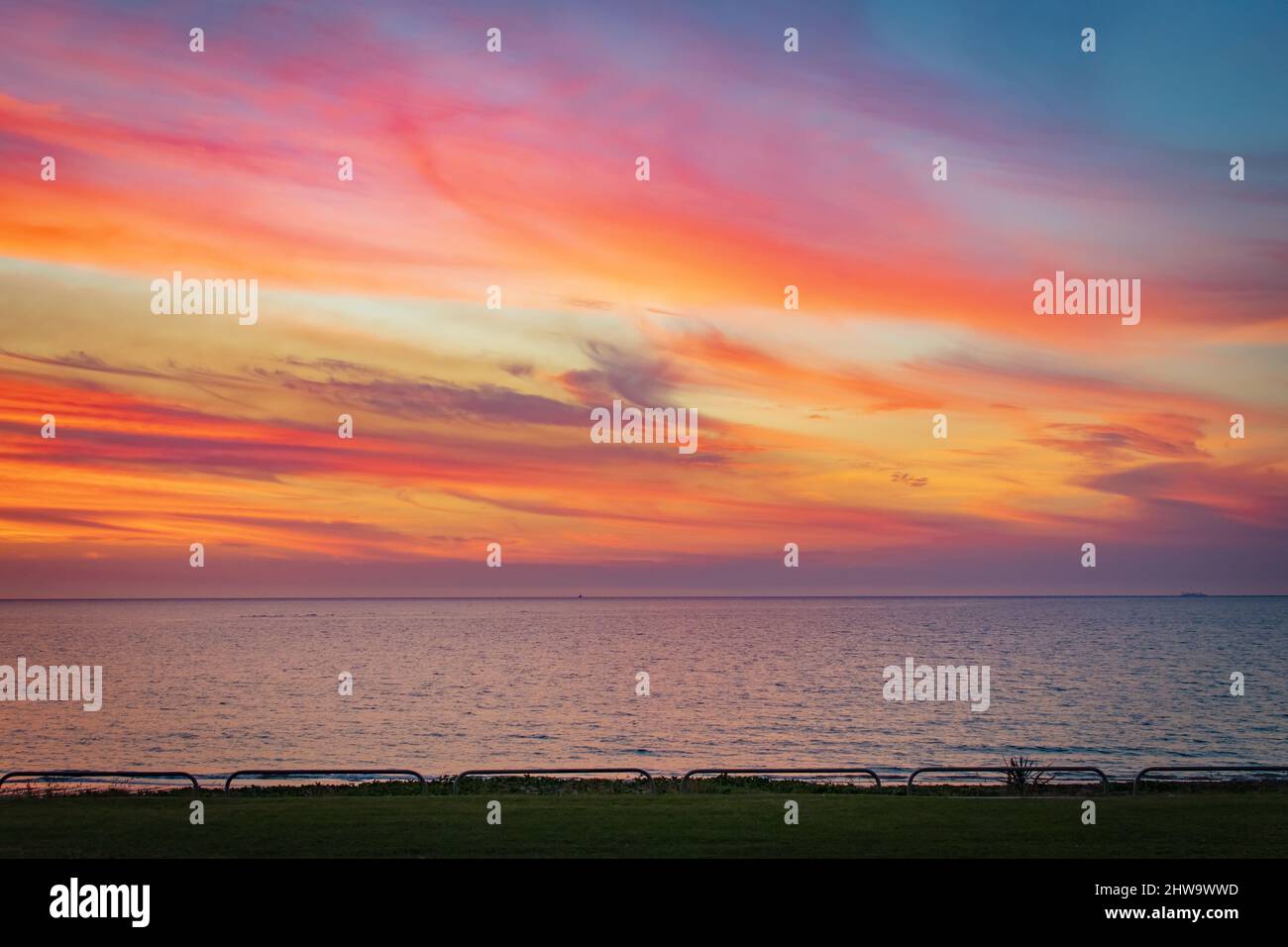 Beautiful photo of colorful sky at sunset and the sea Stock Photo - Alamy
