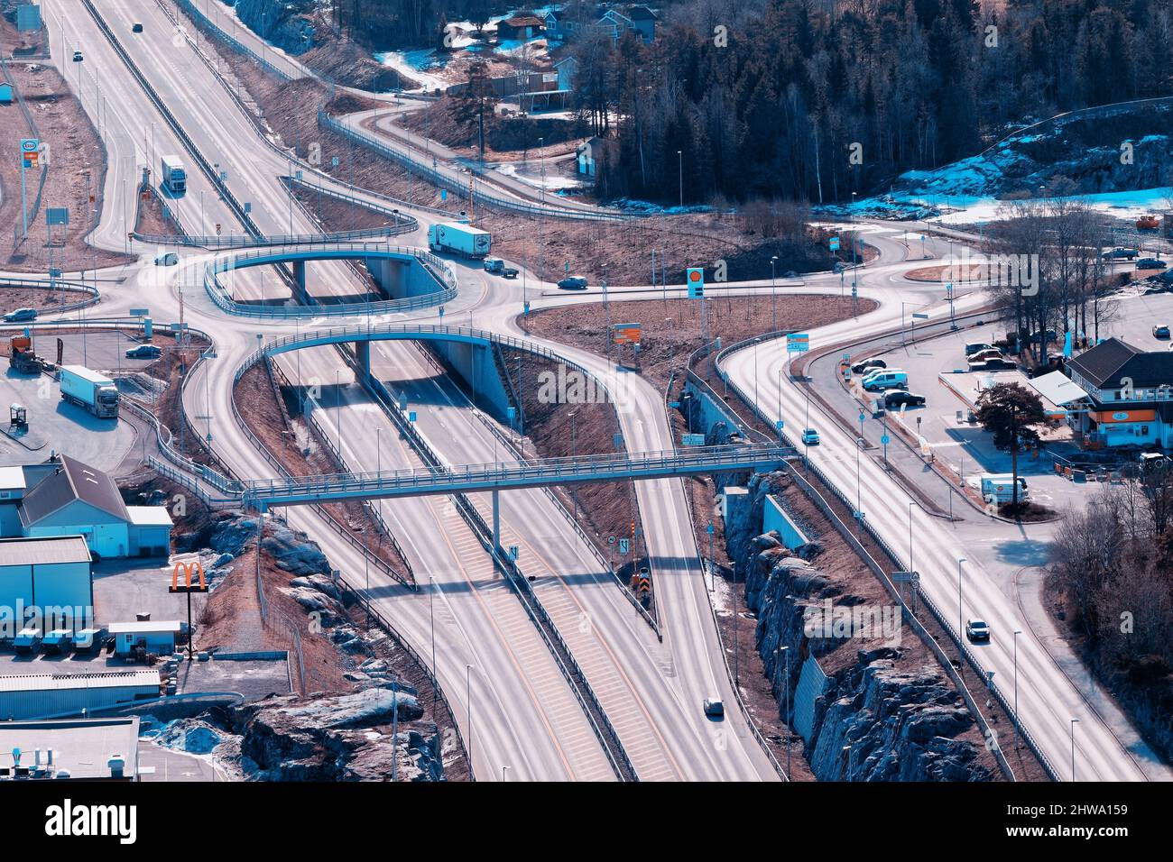 European Route E18 highway between Oslo and Kristiansand. Car passing. View  from the rock above the road, blurred foreground Stock Photo - Alamy