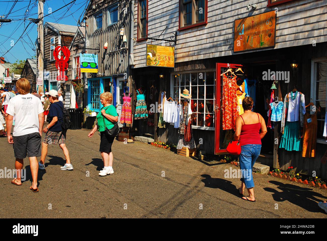 People shop at the boutiques and souvenir shops on Bearskin Neck in Rockport, Massachusetts Stock Photo