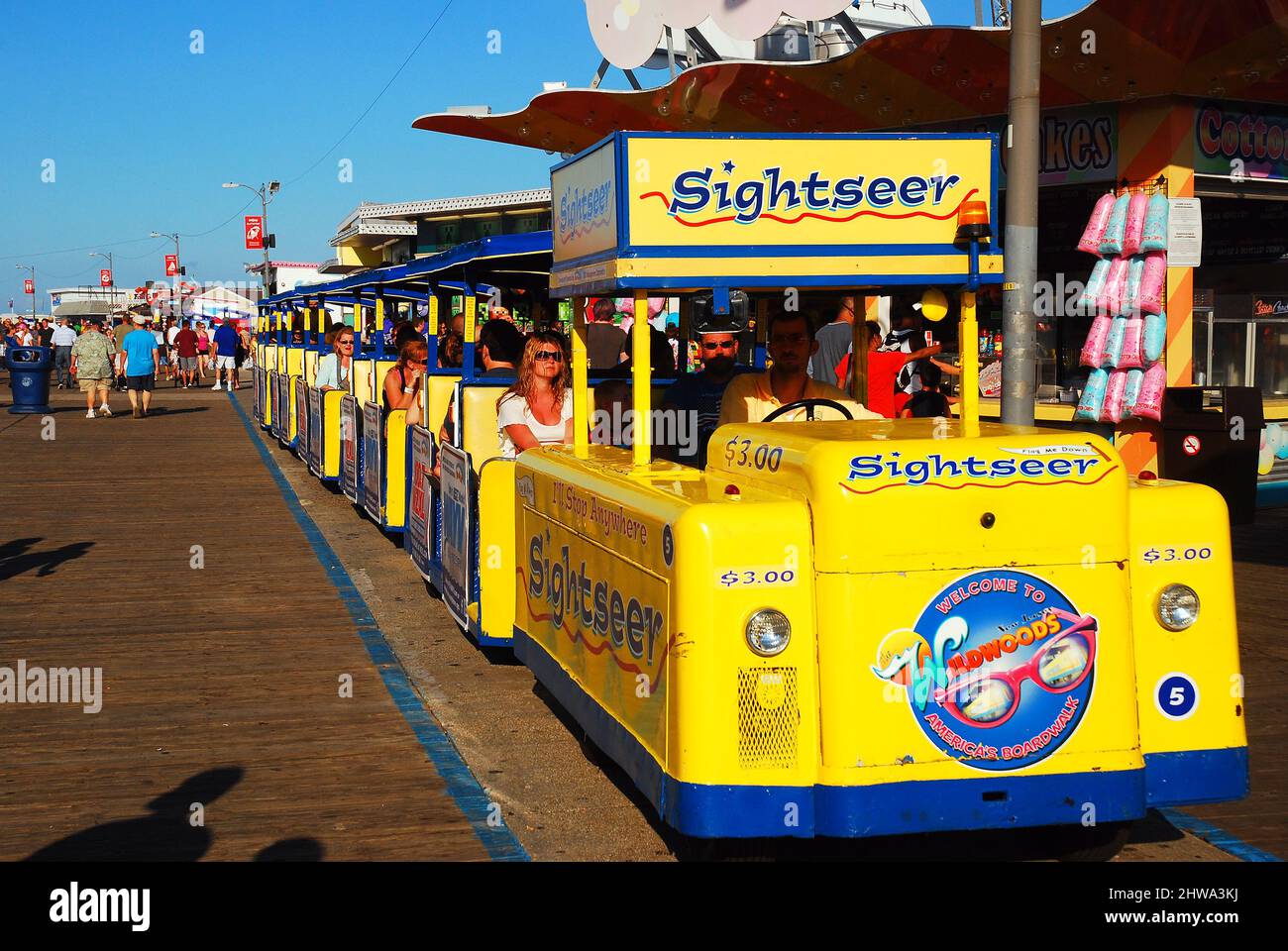 The tram car makes a stop along the Boardwalk in Wildwood, New Jersey Stock Photo