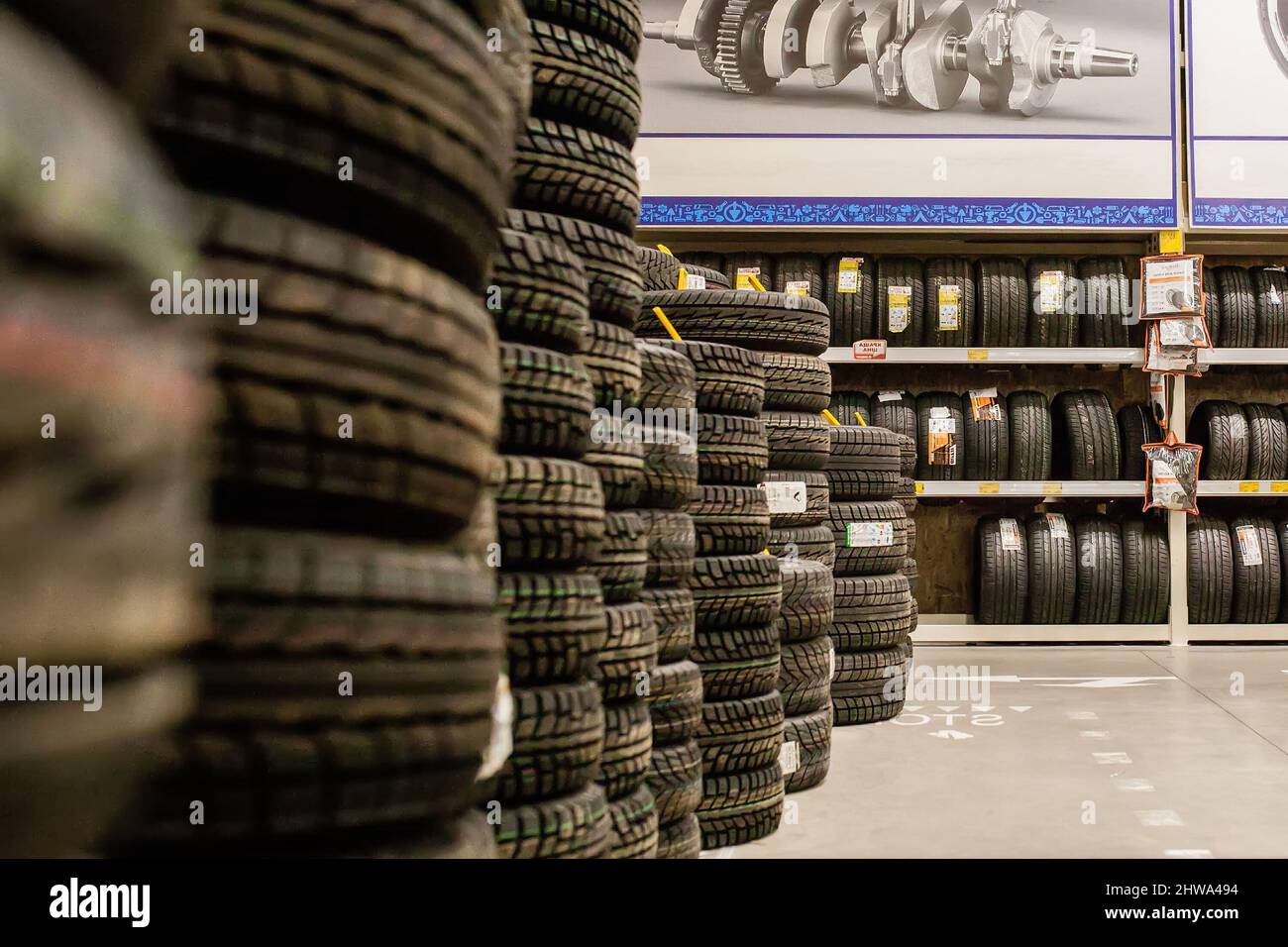 Car tires and wheels at warehouse in tire store Stock Photo Alamy