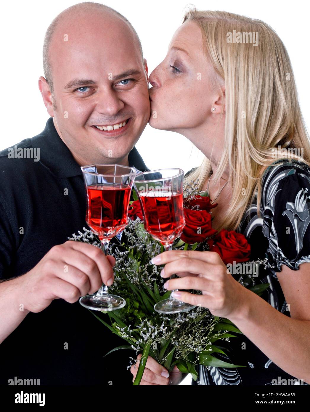 couple in love clink glasses Stock Photo