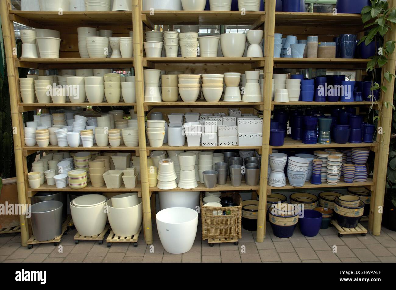 Flower pots for sale in a garden center Stock Photo Alamy