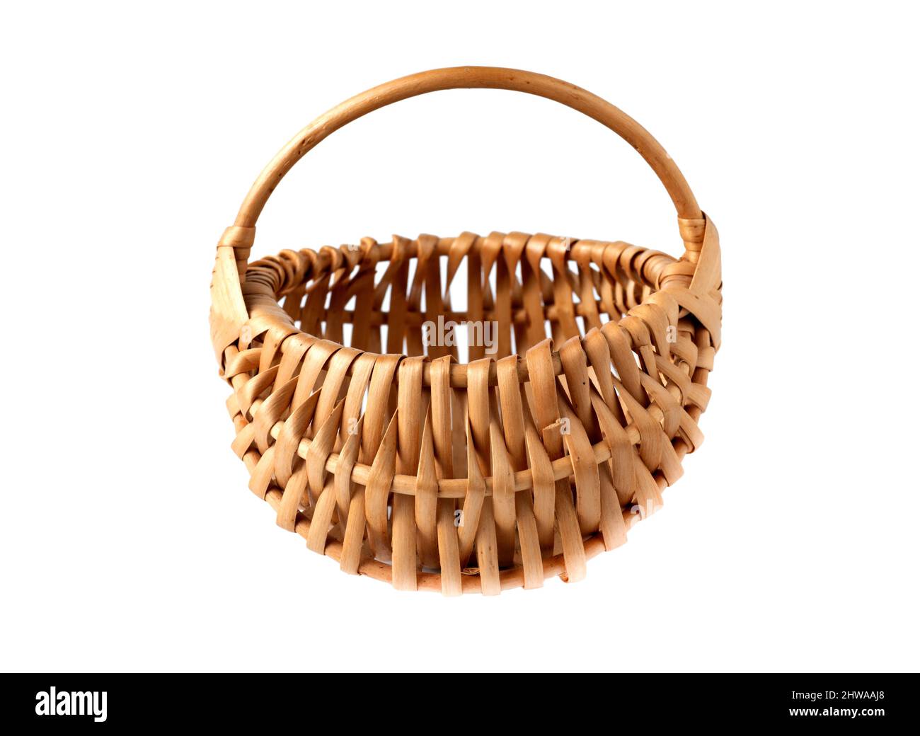 Round form small wicker basket isolated on white background. Stock Photo