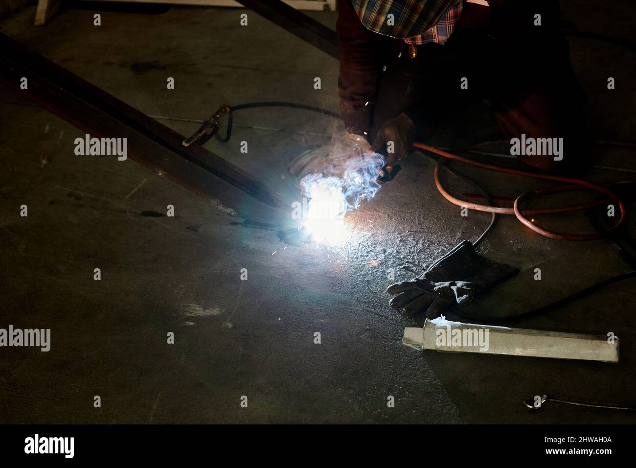 Welder working in the factory Stock Photo