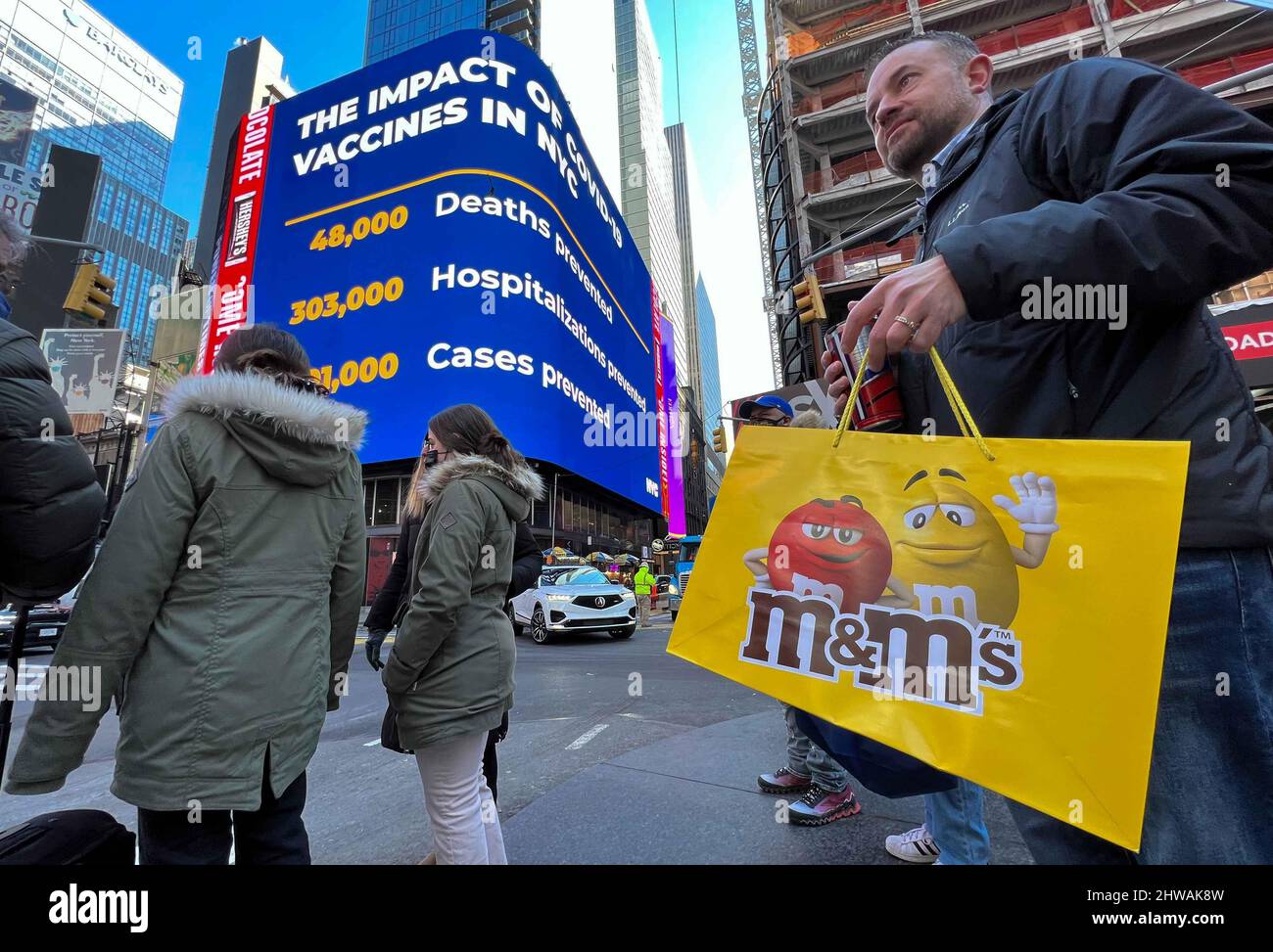 New York, USA. 05th Mar, 2022. (220305) -- NEW YORK, March 5, 2022 (Xinhua) -- People are seen on Times Square in New York, the United States, March 4, 2022. New York City will suspend COVID-19 vaccine passport program and remove indoor mask mandate in public schools for K-12 students starting from next Monday, said New York City Mayor Eric Adams at a press briefing on Friday. The decision is based on a sharp drop of new COVID-19 cases and hospitalizations as well as 96 percent of vaccination rate among adults in the city. (Michael Appleton/Mayoral Photography Office/Handout via Xinhua) Credit Stock Photo