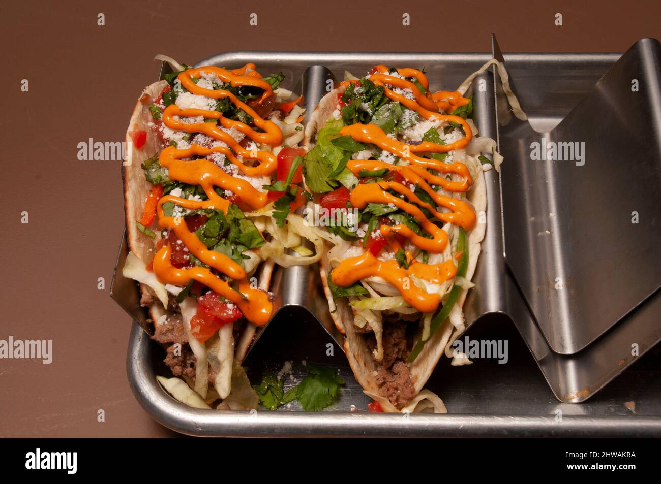 Authentic tex mex mexican cuisine known as a Taco Stock Photo - Alamy