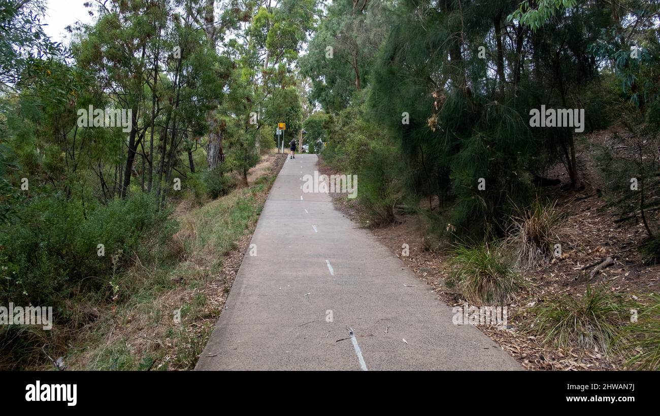 Man walking along the Merri creek trail. Clifton Hill, Melbourne, Victoria, Australia Stock Photo
