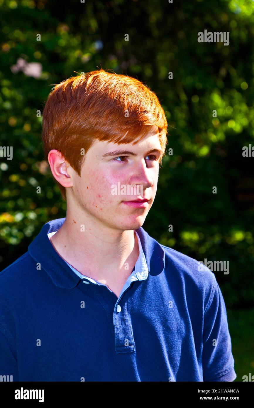 portrait of attractive happy smiling boy in the garden Stock Photo - Alamy