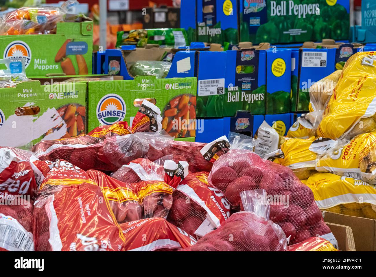 Sam's Club grocery area with boxes of bulk produce items in Snellville, Georgia. (USA) Stock Photo