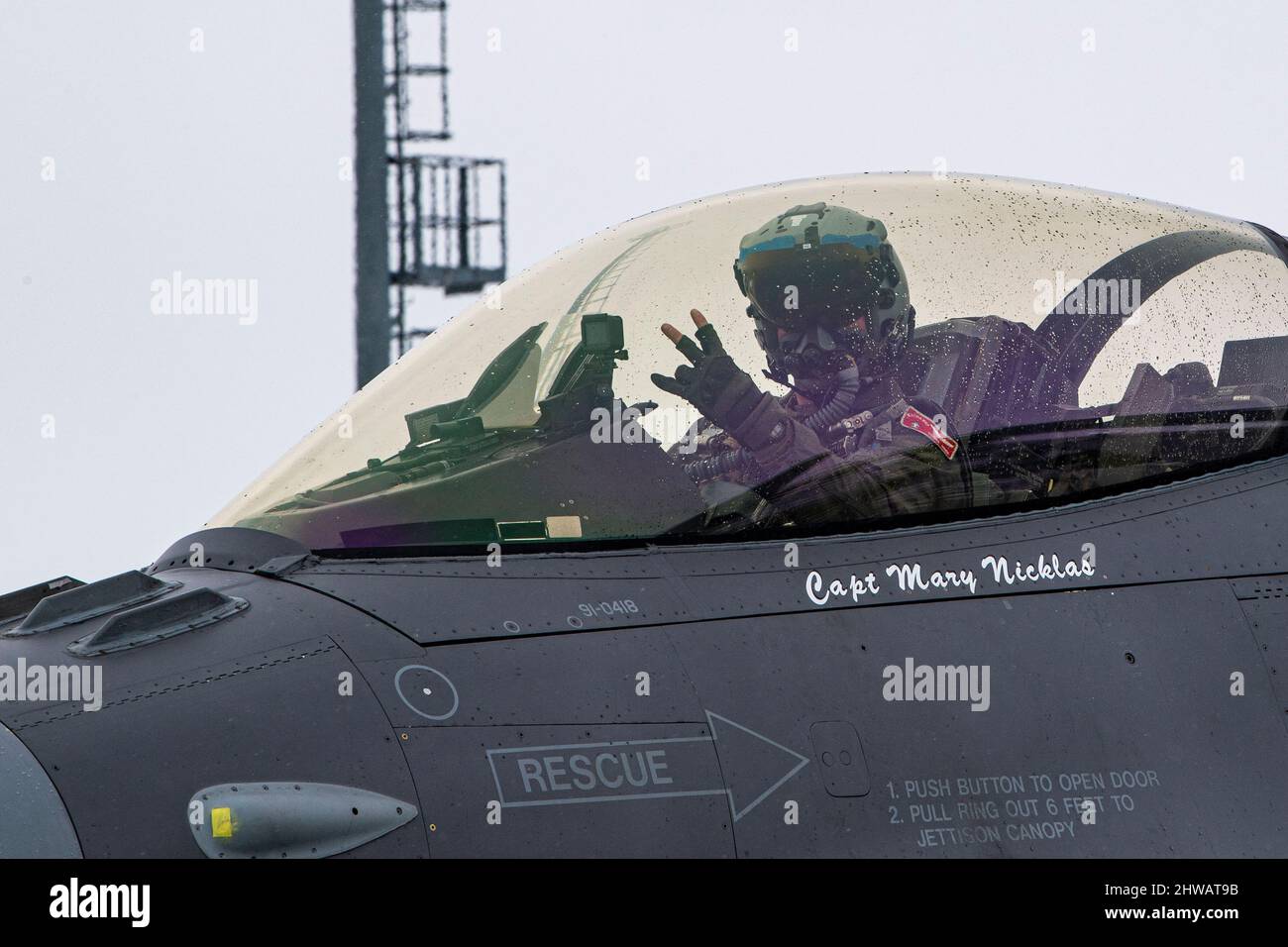 A U.S. Air Force F-16 Fighting Falcon pilot from the 480th Expeditionary Fighter Squadron at Spangdahlem Air Base, Germany, prepares to take off at the 86th Air Base, Romania, March 1, 2022. The ability to deploy air forces at short notice to host airbases or austere locations across NATO’s European area of responsibility is essential for timely and coordinated response for any contingency. (U.S. Air Force photo by Senior Airman Ali Stewart) Stock Photo