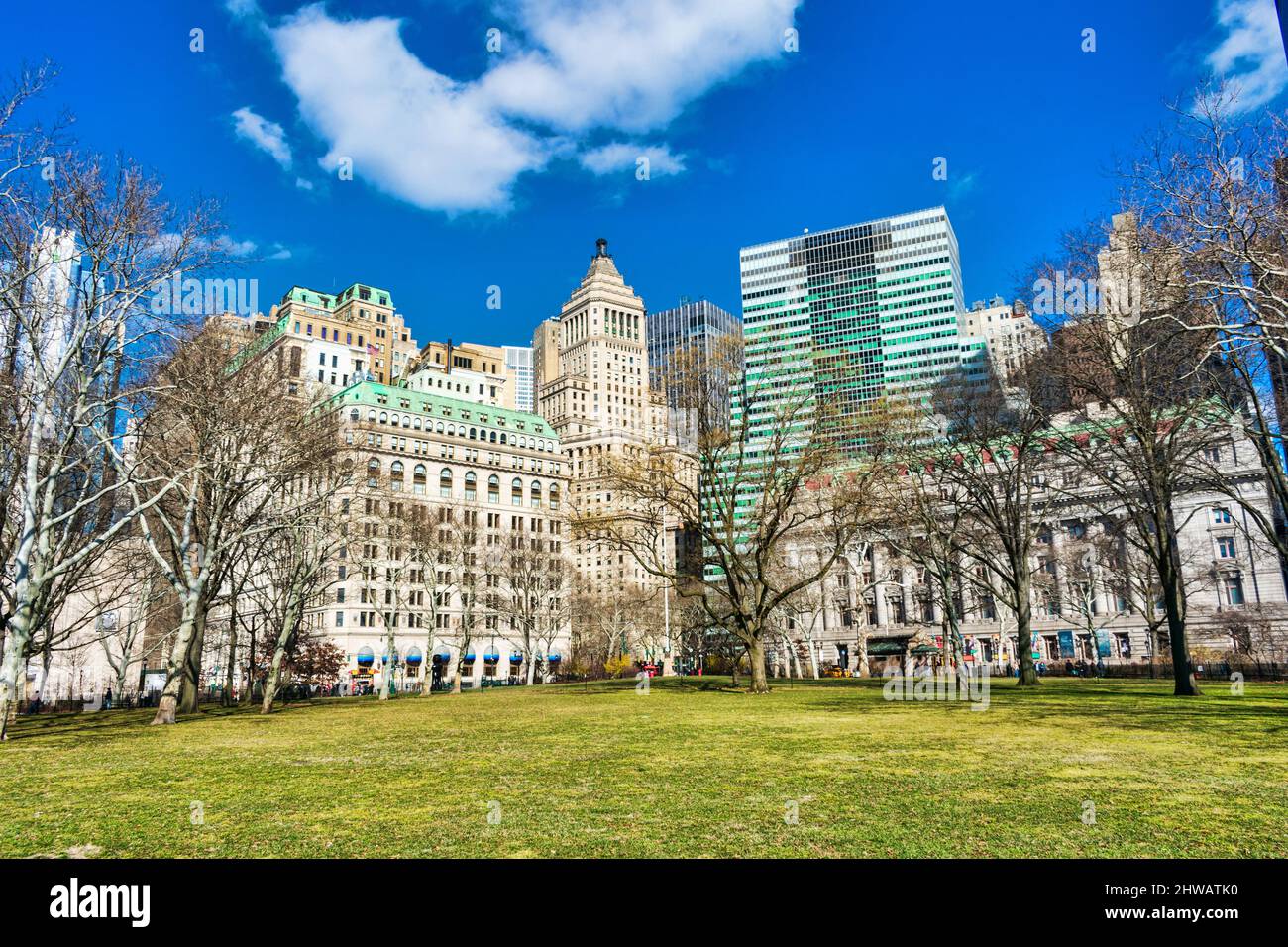 Scenic view of lower Manhattan skyscrapers from the Battery park on sunny winter day. - New York, USA, February 2022 Stock Photo