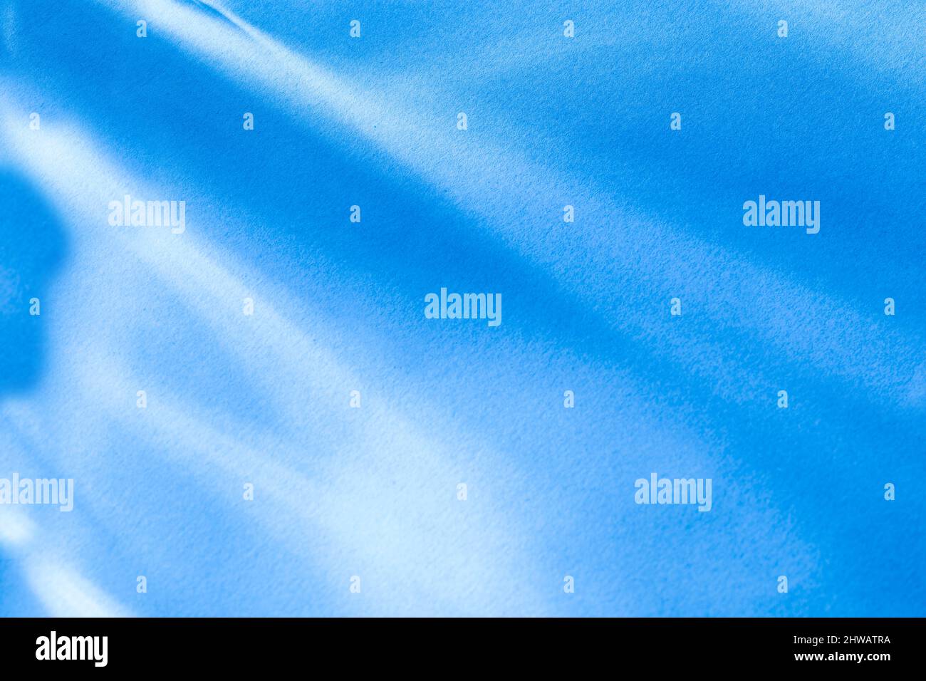 Blue background with light refractions and ididescent effect Stock Photo