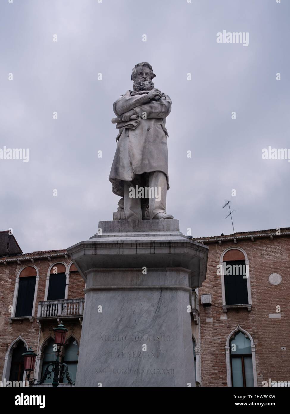 Nicolo Tommaseo Statue on Campo San Stefano in Venice, Italy, made by Francesco Barzaghi in 1882 with inscription 'To Nicolo Tommaseo from the Venetia Stock Photo