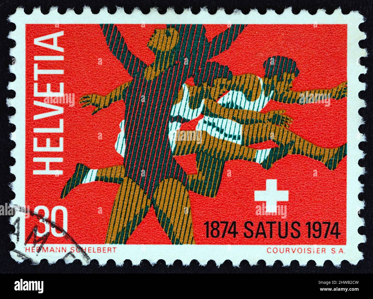 SWITZERLAND - CIRCA 1974: A stamp printed in Switzerland shows Gymnast and hurdlers, circa 1974. Stock Photo